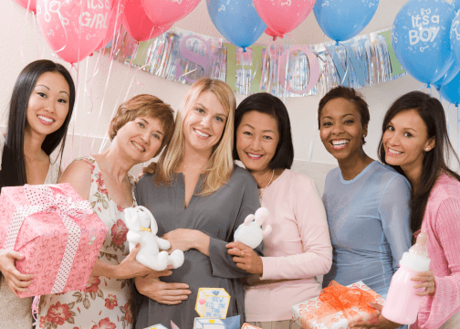 Baby shower party women and balloons